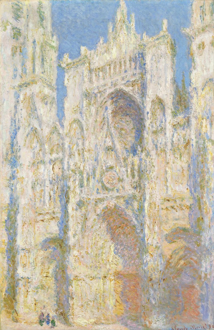 Sunlight turns the cathedral façade into a tapestry of warm cream, pale gold and blue shadows.