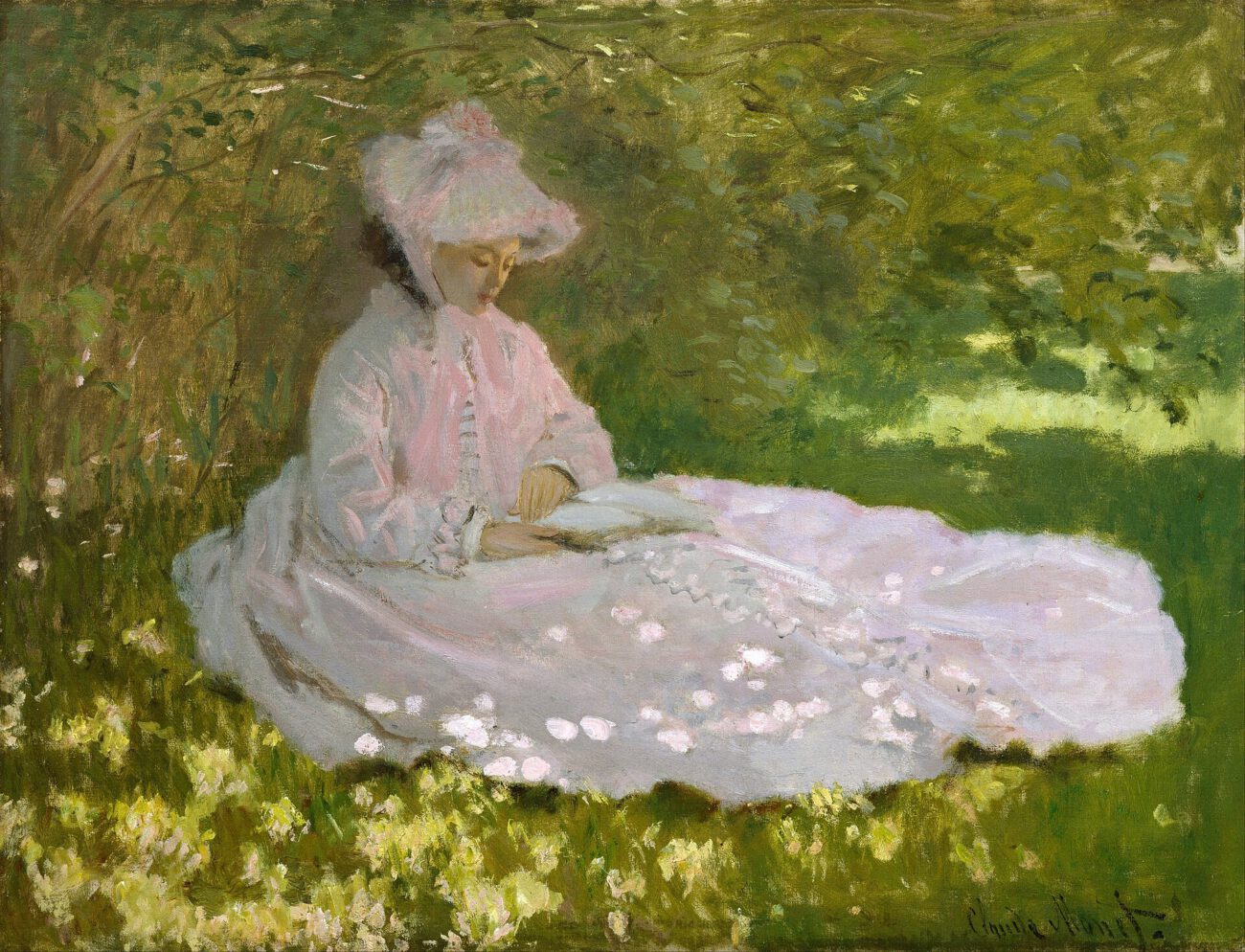 A seated woman reads beneath leafy branches, with dappled sunlight falling across her pale dress.
